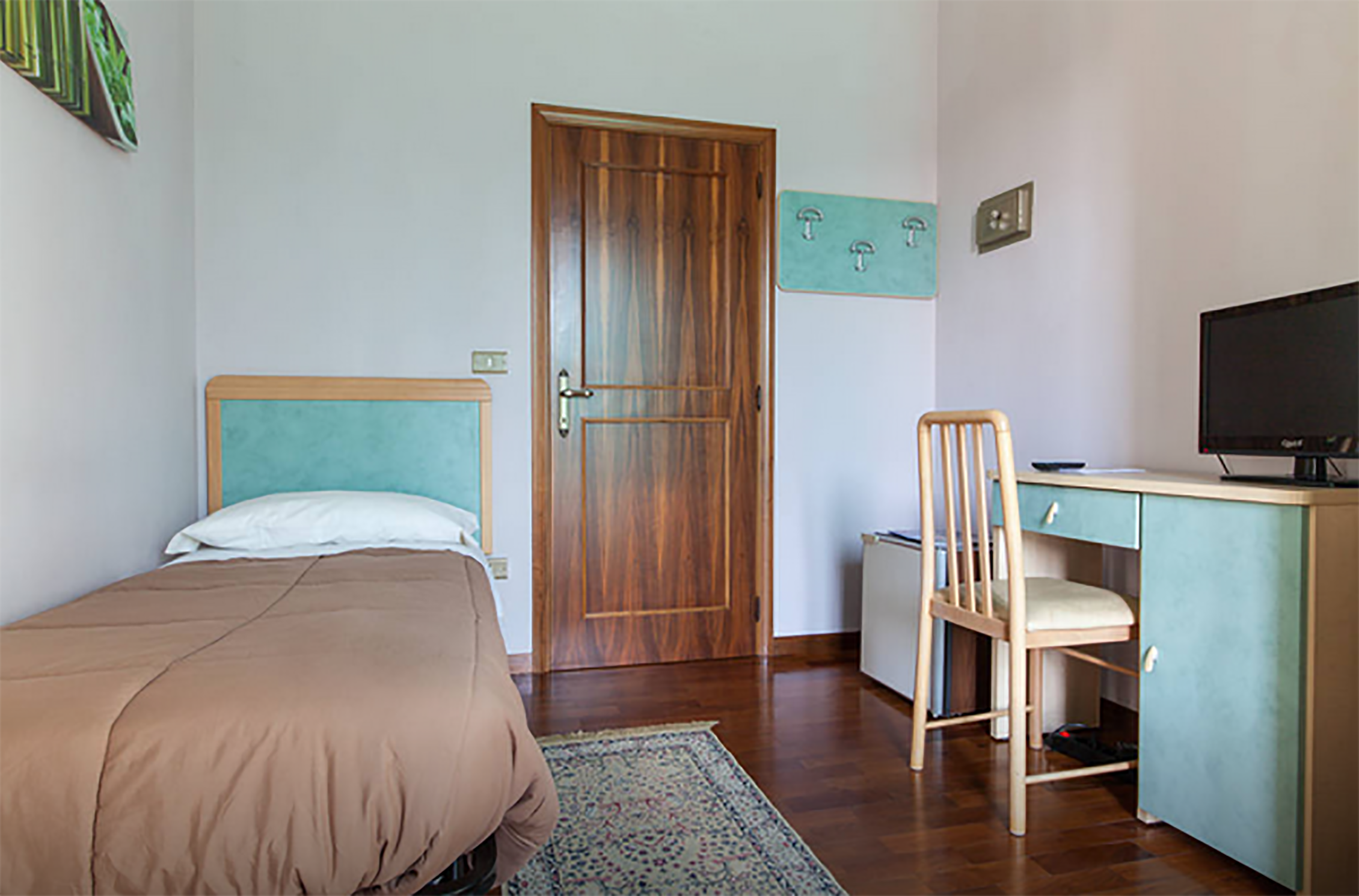 Camera Violetta con letto singolo e accesso al balcone
